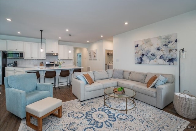 6448 Twin Falls Ter, Moseley, VA 23120 - living room featuring wood finished floors and recessed lighting