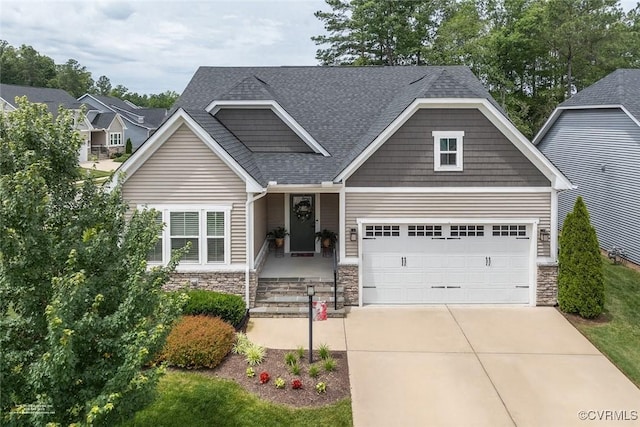 6448 Twin Falls Ter, Moseley, VA 23120 - craftsman-style home featuring stone siding, driveway, a garage, and a shingled roof