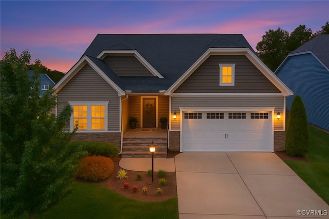 6448 Twin Falls Ter, Moseley, VA 23120 - view of front of house with stone siding, concrete driveway, a garage, and a yard