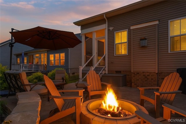 6448 Twin Falls Ter, Moseley, VA 23120 - back of house with an outdoor fire pit and a patio