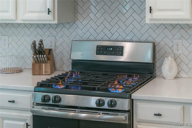 6448 Twin Falls Ter, Moseley, VA 23120 - kitchen view of gas stove, decorative backsplash, and light countertops