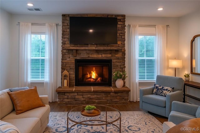 6448 Twin Falls Ter, Moseley, VA 23120 - living room with wood finished floors, healthy amount of natural light, and recessed lighting