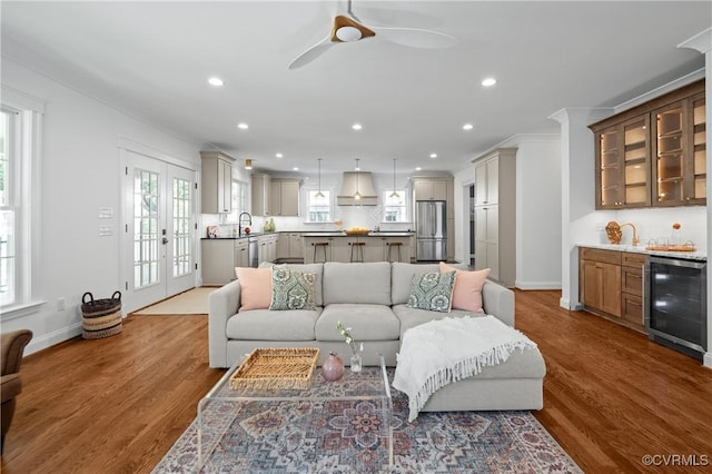 4705 Fitzhugh Ave, Richmond, VA 23230 - living room with wine cooler, bar with sink, dark wood-type flooring, recessed lighting, and ceiling fan