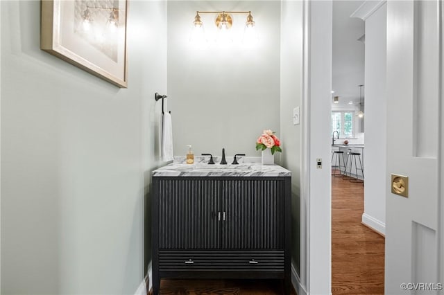 4705 Fitzhugh Ave, Richmond, VA 23230 - bar area with wood finished floors and a sink