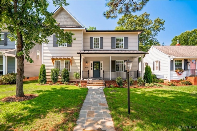 4705 Fitzhugh Ave, Richmond, VA 23230 - view of front facade with a standing seam roof, covered porch, a metal roof, and a front lawn