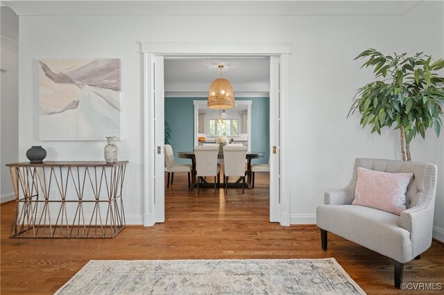 4705 Fitzhugh Ave, Richmond, VA 23230 - hallway featuring wood finished floors and ornamental molding