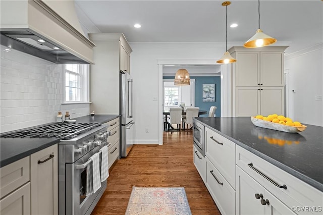 4705 Fitzhugh Ave, Richmond, VA 23230 - kitchen featuring stainless steel appliances, premium range hood, crown molding, decorative backsplash, and decorative light fixtures