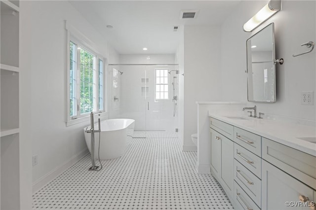 4705 Fitzhugh Ave, Richmond, VA 23230 - bathroom with a stall shower, double vanity, and a freestanding tub