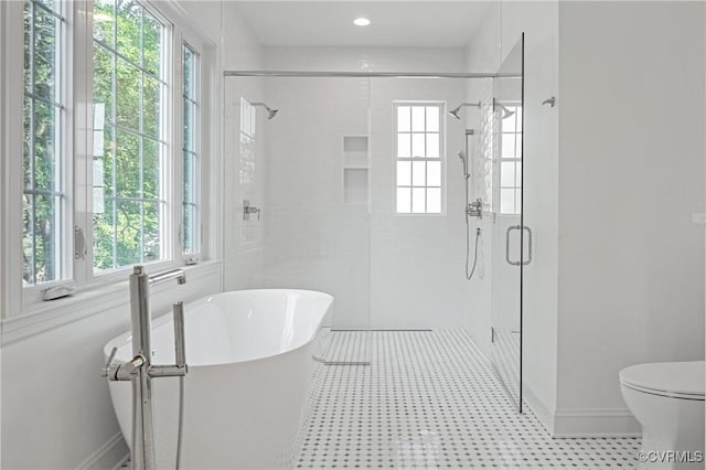 4705 Fitzhugh Ave, Richmond, VA 23230 - full bathroom featuring plenty of natural light, a freestanding tub, and a stall shower