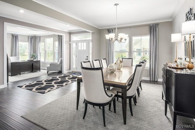 8701 Abercrombie Dr, Chesterfield, VA 23838 - dining space featuring a chandelier, crown molding, and wood finished floors