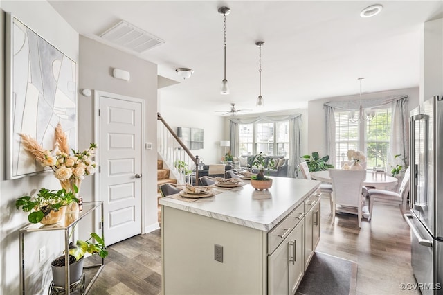 7828 Vermeil St, North Chesterfield, VA 23237 - kitchen featuring high end refrigerator, wood finished floors, light countertops, a ceiling fan, and a kitchen island