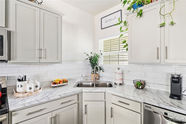 7828 Vermeil St, North Chesterfield, VA 23237 - kitchen with stainless steel appliances, backsplash, white cabinets, and light stone counters