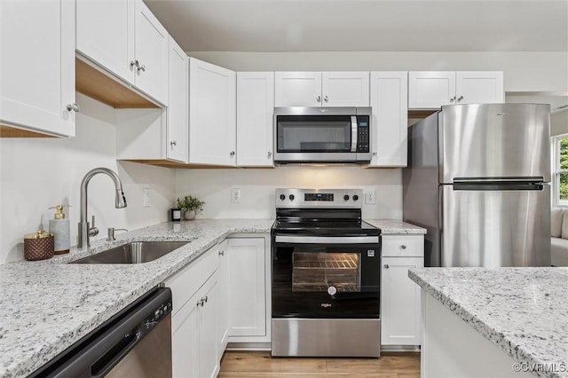 5720 Centerville Rd, Williamsburg, VA 23188 - kitchen featuring appliances with stainless steel finishes and white cabinets