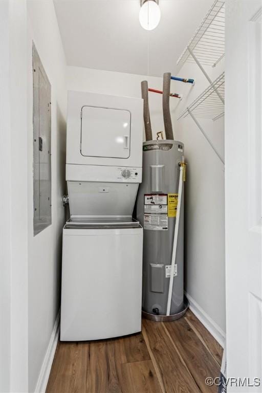 5720 Centerville Rd, Williamsburg, VA 23188 - laundry room with electric water heater, stacked washing machine and dryer, wood finished floors, and electric panel