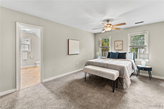 7707 Northern Dancer Ct, Midlothian, VA 23112 - carpeted bedroom with ensuite bath and a ceiling fan