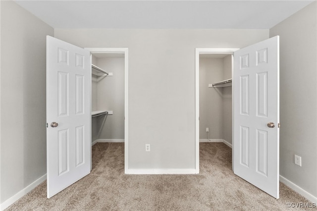 7707 Northern Dancer Ct, Midlothian, VA 23112 - unfurnished bedroom with a spacious closet and carpet flooring