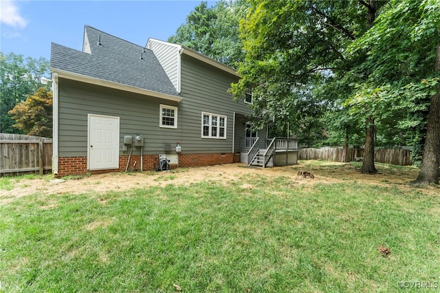 7707 Northern Dancer Ct, Midlothian, VA 23112 - back of property with a fenced backyard, a shingled roof, and a wooden deck
