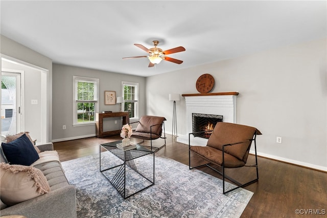 7707 Northern Dancer Ct, Midlothian, VA 23112 - living room with a brick fireplace, a ceiling fan, and wood finished floors