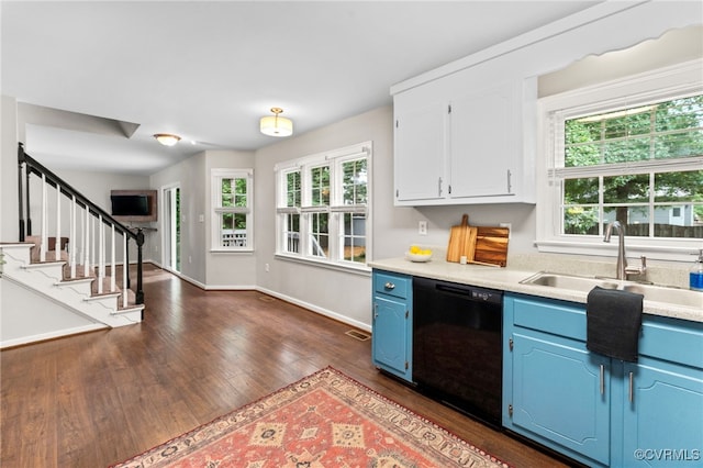7707 Northern Dancer Ct, Midlothian, VA 23112 - kitchen with dishwasher, blue cabinetry, dark wood-type flooring, and healthy amount of natural light