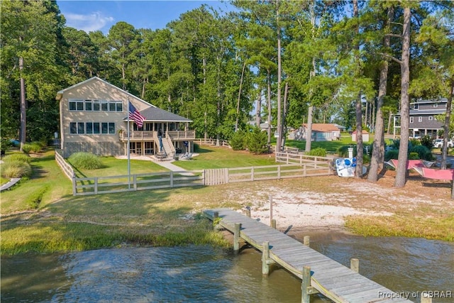 11 Franklin St, Deltaville, VA 23043 - dock with a fenced backyard and a deck with water view