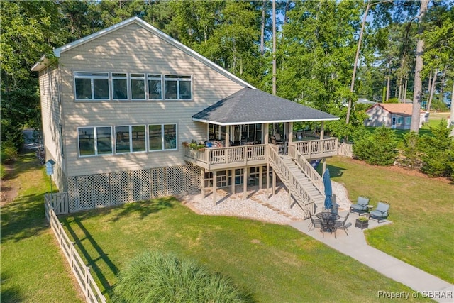 11 Franklin St, Deltaville, VA 23043 - rear view of property featuring a wooden deck, stairs, a patio, and view of scattered trees