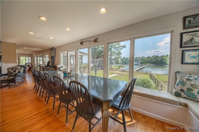 11 Franklin St, Deltaville, VA 23043 - dining space with recessed lighting, light wood-style flooring, and a water view
