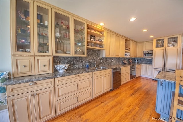 11 Franklin St, Deltaville, VA 23043 - kitchen with black appliances, open shelves, decorative backsplash, light wood finished floors, and recessed lighting