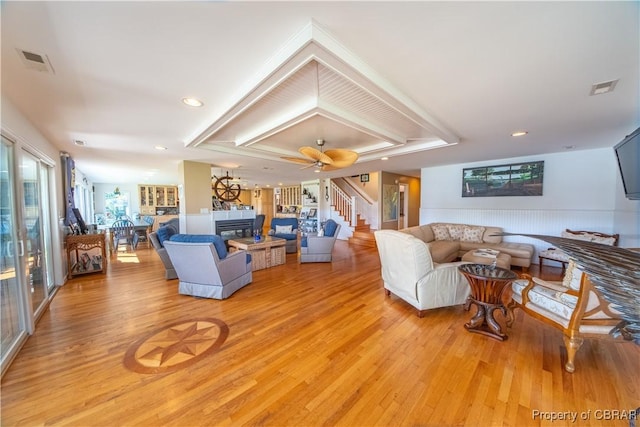 11 Franklin St, Deltaville, VA 23043 - living room with light wood-type flooring, stairway, ceiling fan, and recessed lighting