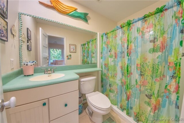 11 Franklin St, Deltaville, VA 23043 - full bathroom featuring vanity, tile patterned flooring, and curtained shower