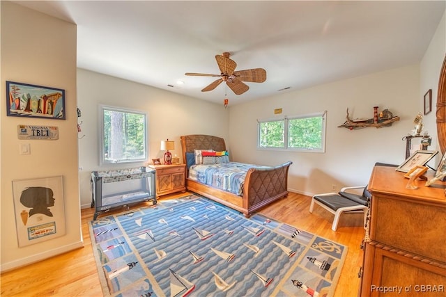 11 Franklin St, Deltaville, VA 23043 - bedroom featuring light wood-style floors and ceiling fan