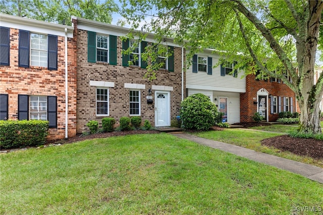 1553 United Ct, Henrico, VA 23238 - view of property with a front yard and brick siding