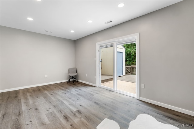 1553 United Ct, Henrico, VA 23238 - spare room with wood finished floors and recessed lighting