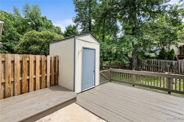 1553 United Ct, Henrico, VA 23238 - wooden deck featuring a storage unit and view of wooded area