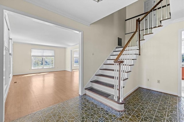 3000 W Riverside Ave, Hopewell, VA 23860 - staircase with baseboards and crown molding