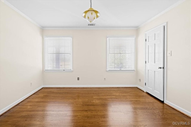 3000 W Riverside Ave, Hopewell, VA 23860 - unfurnished room featuring ornamental molding, plenty of natural light, and wood finished floors