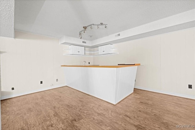 3000 W Riverside Ave, Hopewell, VA 23860 - unfurnished room with wood finished floors and a textured ceiling
