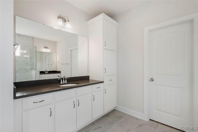 8124 Clancy Ct, Chesterfield, VA 23838 - bathroom featuring vanity, a marble finish shower, and marble finish floors