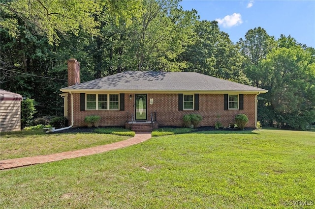 2001 Hicks Rd, North Chesterfield, VA 23235 - single story home with a front lawn, a chimney, and brick siding