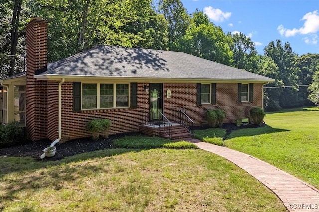 2001 Hicks Rd, North Chesterfield, VA 23235 - single story home featuring a chimney, a front yard, brick siding, and a shingled roof