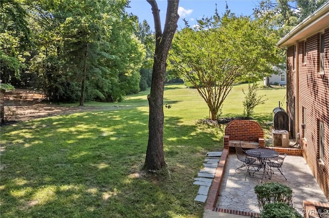 2001 Hicks Rd, North Chesterfield, VA 23235 - view of grassy yard with a patio