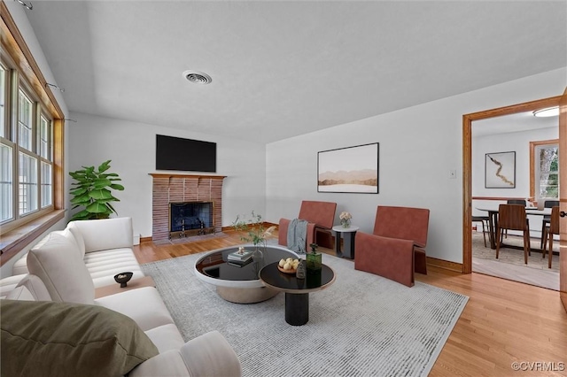2001 Hicks Rd, North Chesterfield, VA 23235 - living area featuring light wood-type flooring and a fireplace