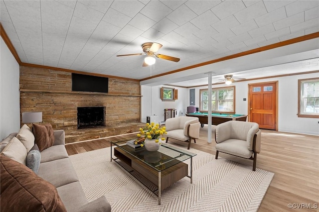 2001 Hicks Rd, North Chesterfield, VA 23235 - living area featuring ceiling fan, billiards table, light wood finished floors, crown molding, and a stone fireplace