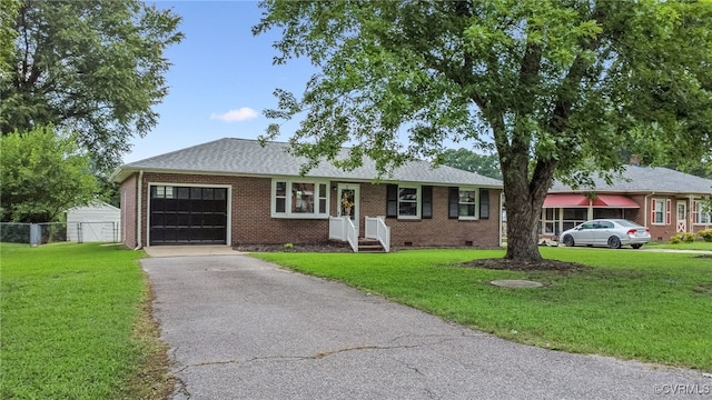 4308 Sunset Dr, North Dinwiddie, VA 23803 - ranch-style home with an attached garage, driveway, brick siding, crawl space, and a shingled roof