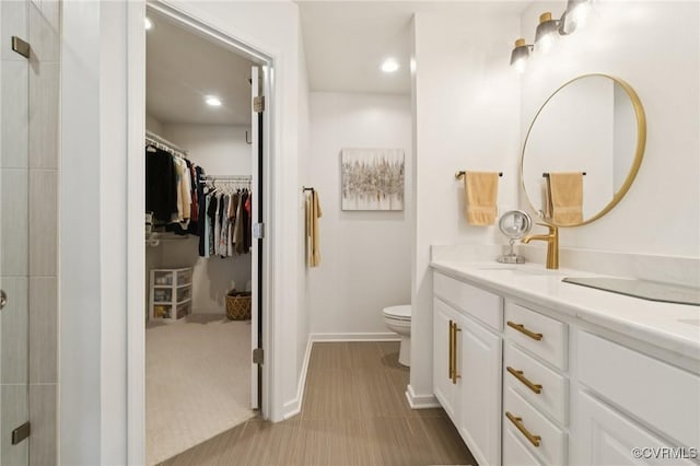 14424 Michaux Village Dr, Midlothian, VA 23113 - full bathroom featuring double vanity, a spacious closet, tiled shower, and recessed lighting