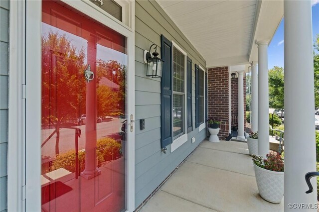 14424 Michaux Village Dr, Midlothian, VA 23113 - view of exterior entry featuring a porch and brick siding