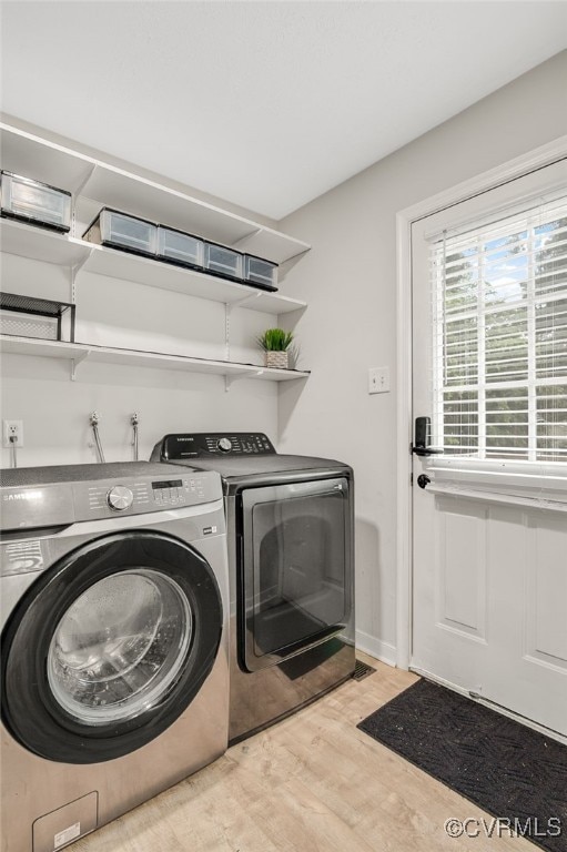 14210 Cherry St, Chester, VA 23831 - washroom featuring washing machine and dryer and wood finished floors