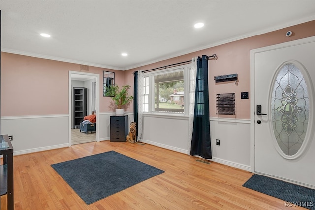 14210 Cherry St, Chester, VA 23831 - entryway featuring light wood-type flooring, ornamental molding, and recessed lighting