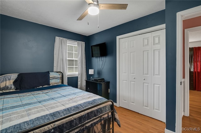 14210 Cherry St, Chester, VA 23831 - bedroom featuring wood finished floors, a closet, and a ceiling fan