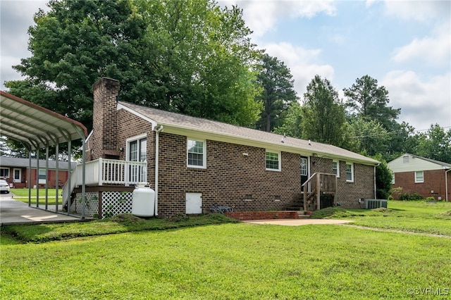 14210 Cherry St, Chester, VA 23831 - view of front of property with a front lawn, brick siding, a chimney, a detached carport, and stairs