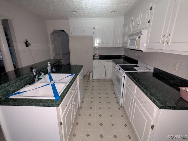 12703 Colby Cove Ct, Chester, VA 23831 - kitchen featuring white appliances and white cabinetry